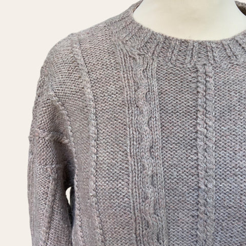 Pull lainé en maille torsadée