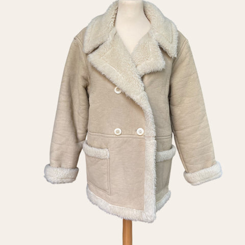 Manteau effet peau lainée