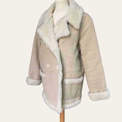 Manteau effet peau lainée