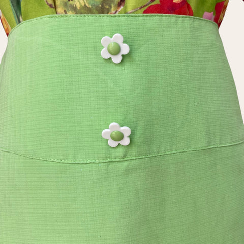 Mini skirt with flower buttons