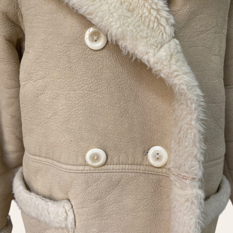 Manteau effet peau lainée