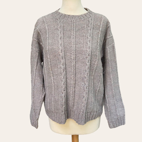 Pull lainé en maille torsadée