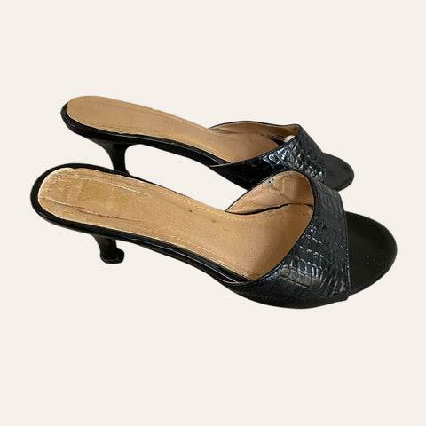 Mules croco à talons