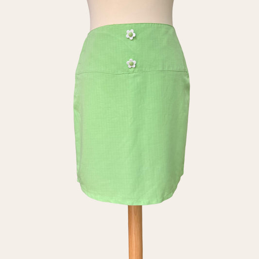 Mini skirt with flower buttons