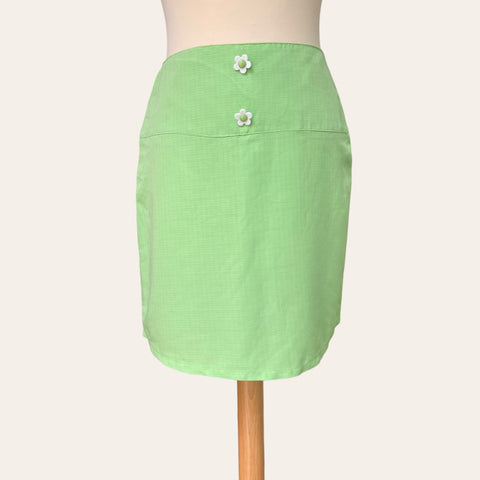 Mini skirt with flower buttons