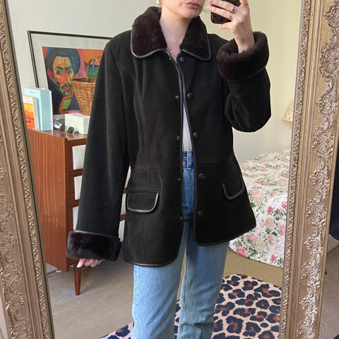 Manteau en cuir et fourrure