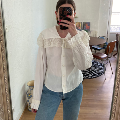 Shirt with large serrated collar