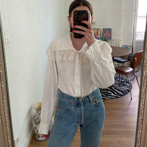 Shirt with large serrated collar